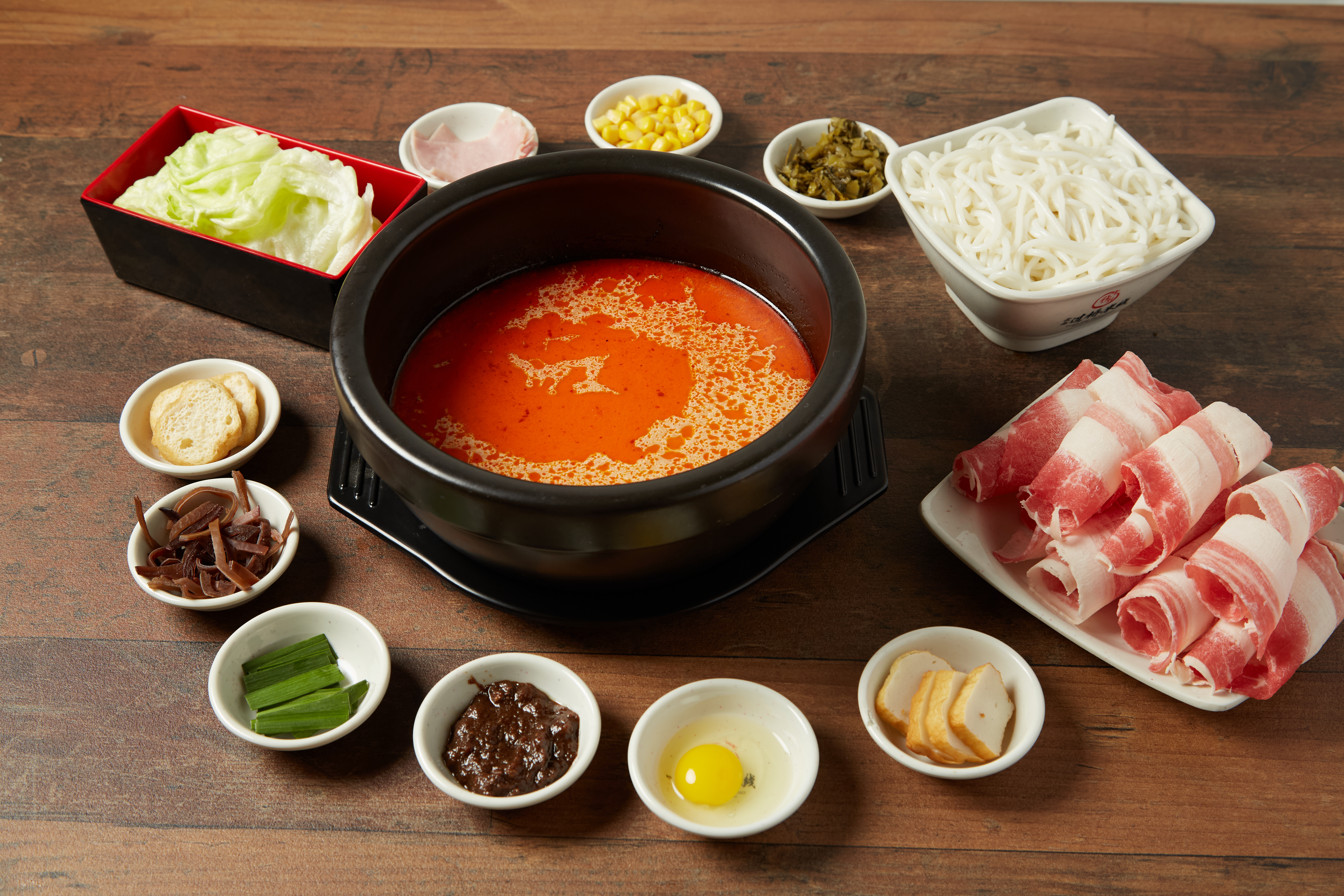 Crossing the Bridge noodle set with broth and toppings